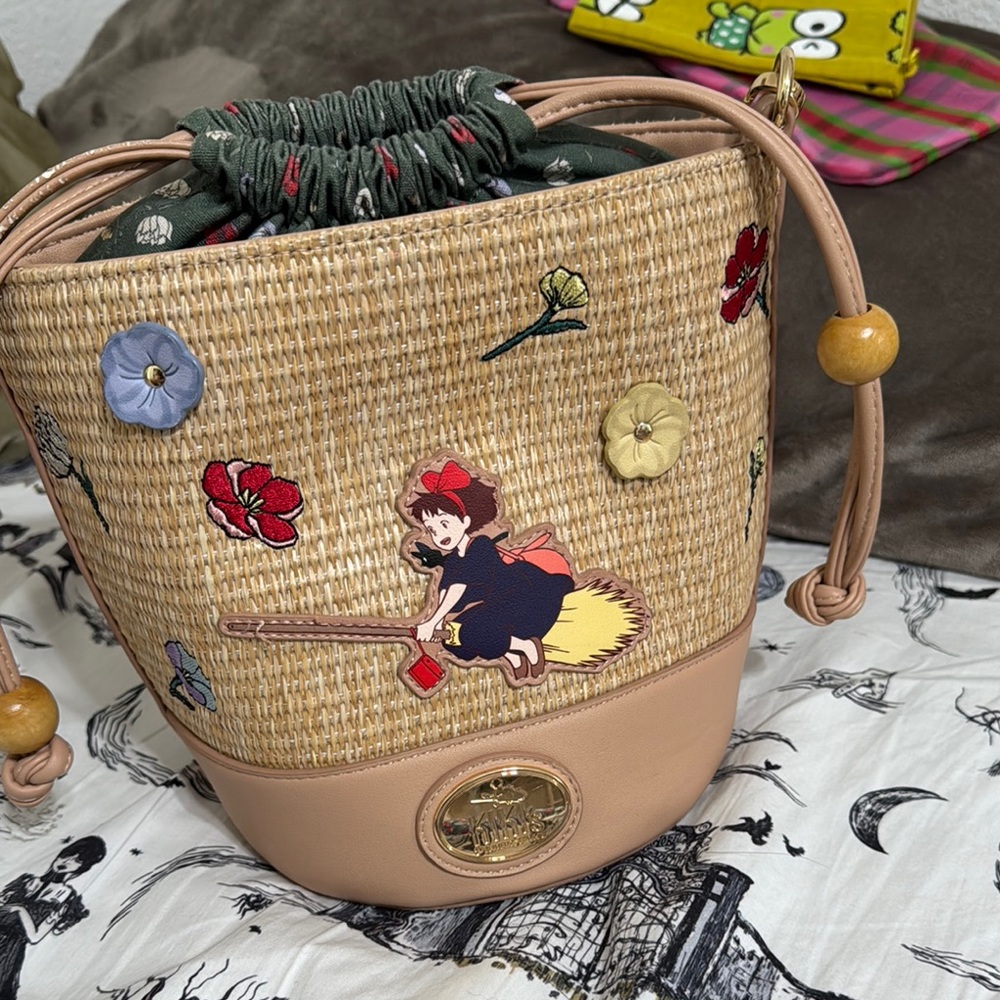 Kiki’s delivery service Embroidered Straw Bucket Bag with Tan Accents